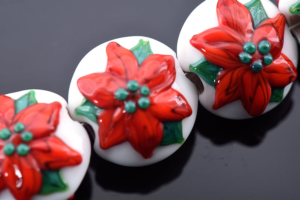 10707812 - Four Red Poinsettia Christmas Lentil Beads