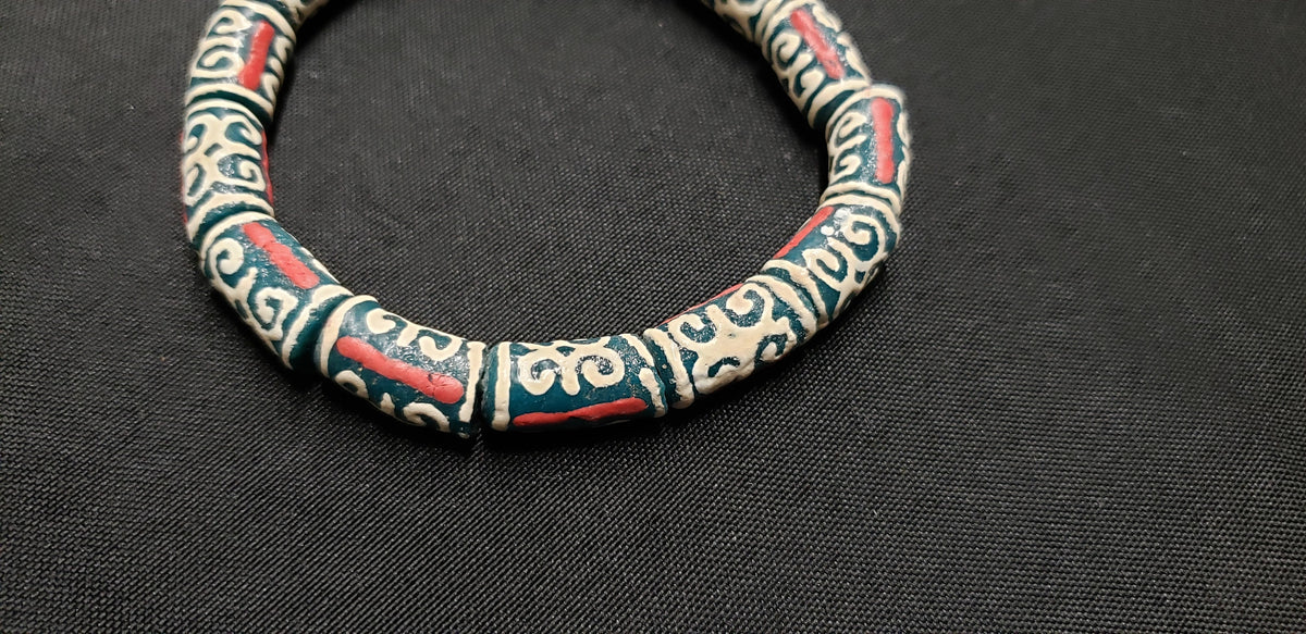African Recycled Glass Beads Symbolizing Humility and Strength: Crafting with Meaning.