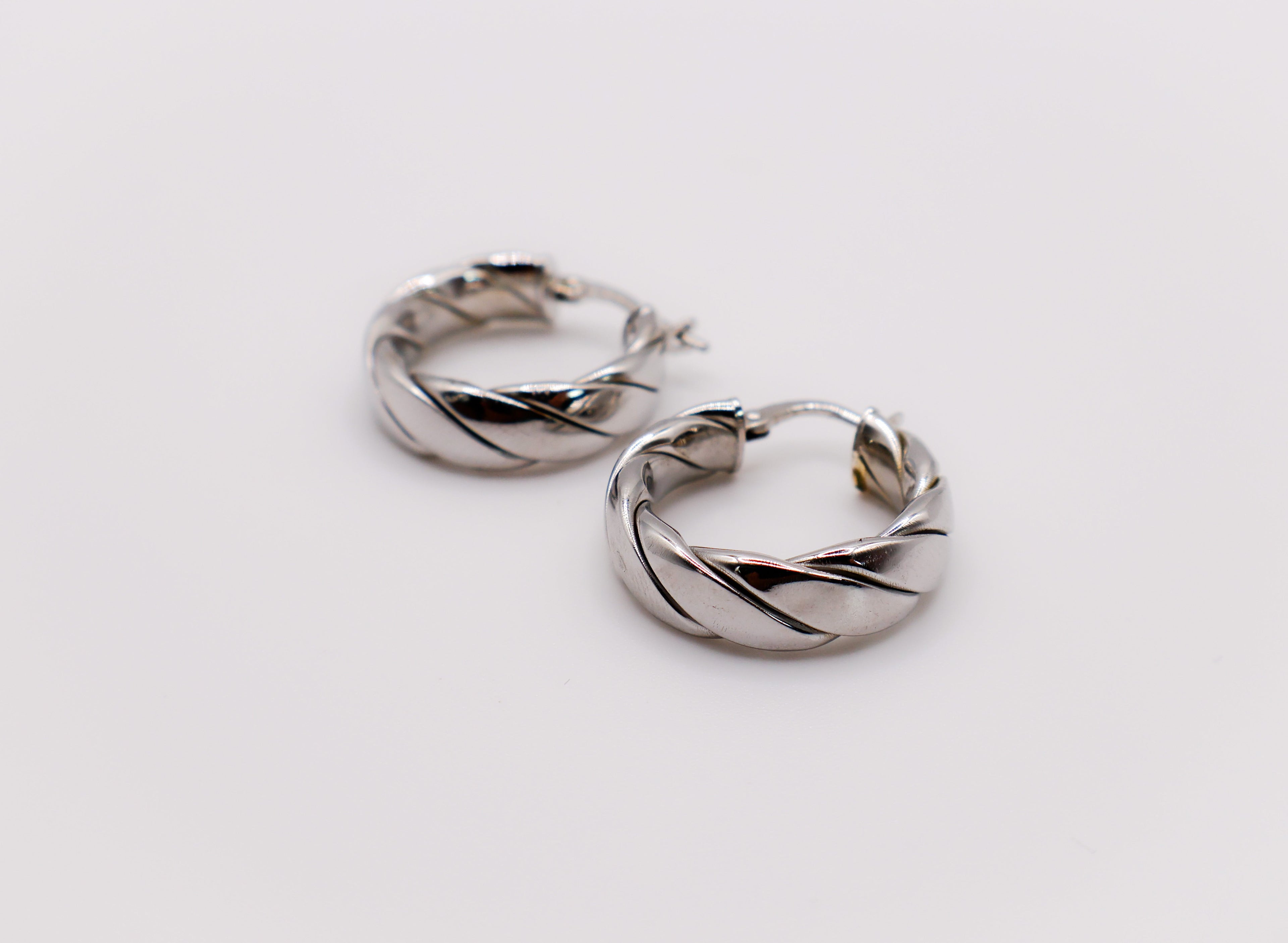 Italian Twirl Sterling Silver Hoop Earrings – Elegant Twisted Design