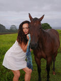 Model in a navy floral silk scarf, photographed at Olson Keolanui Farms in Hilo.
