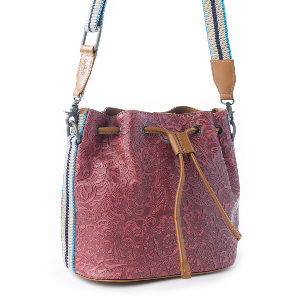 Myra Emberlace Embossed Leather Bucket Bag in Berry Rouge