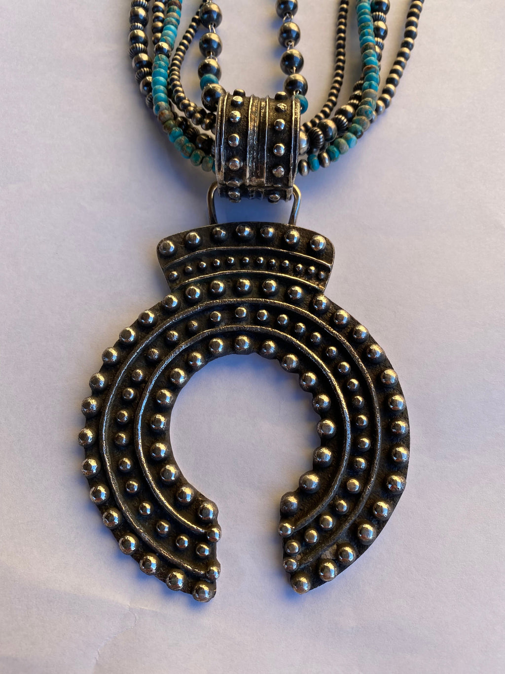 Handcrafted Sterling Silver Ball Cast Naja by Delbert Arviso